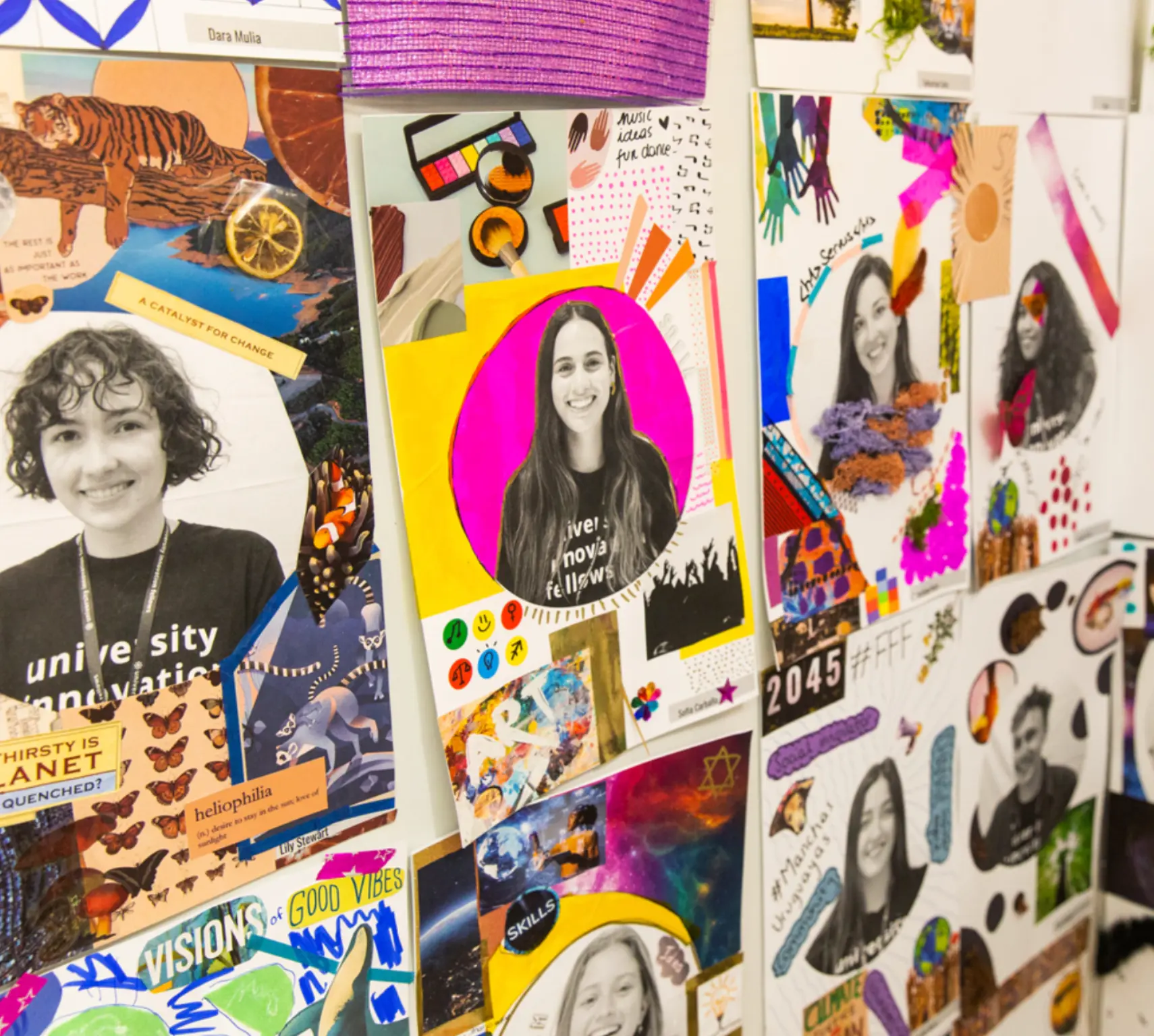 Wall of participant collage portraits mixing photographs, painted suns, hands and hand-written words of identity and hope.